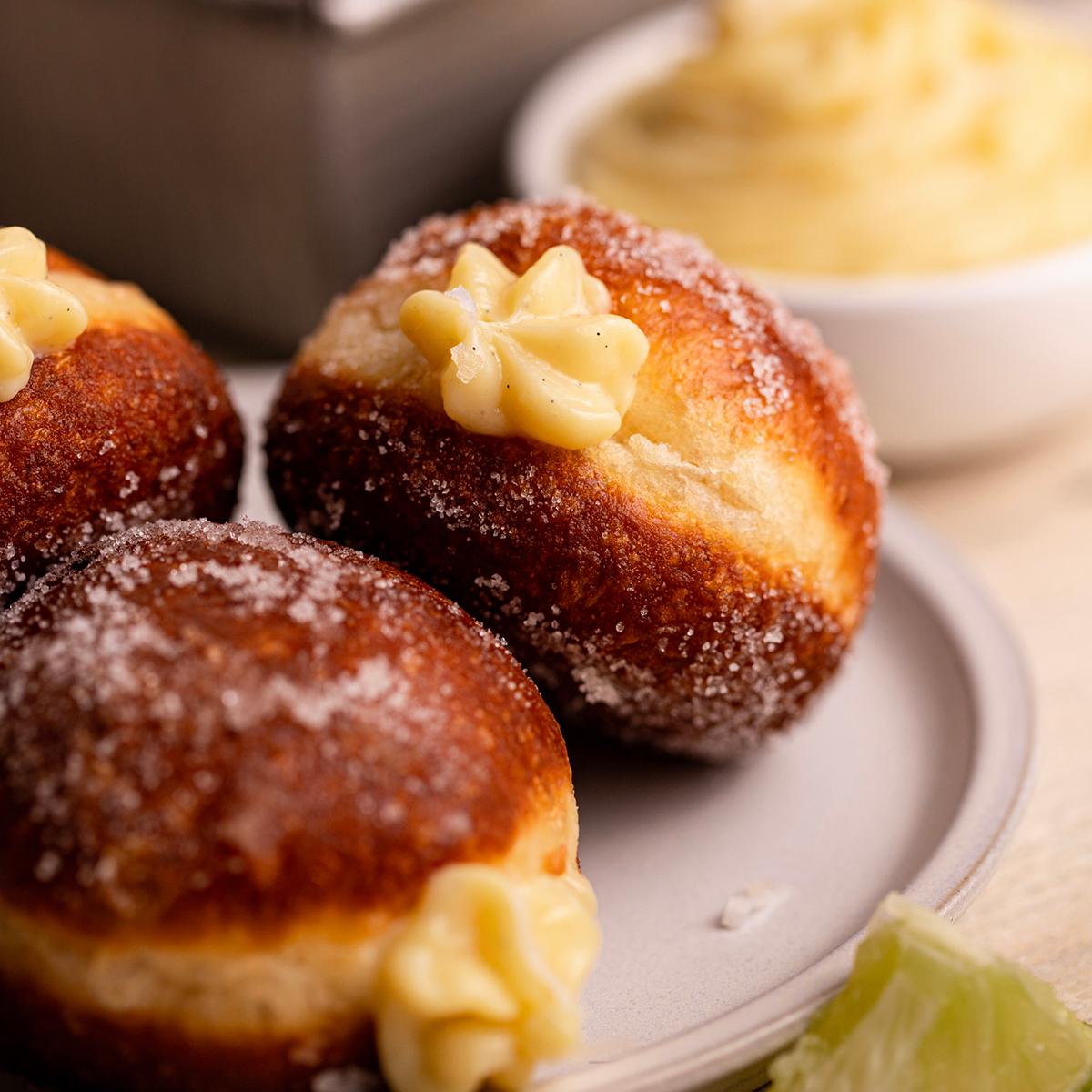 Homemade Doughnuts with Vanilla Bean Coconut Cream Filling